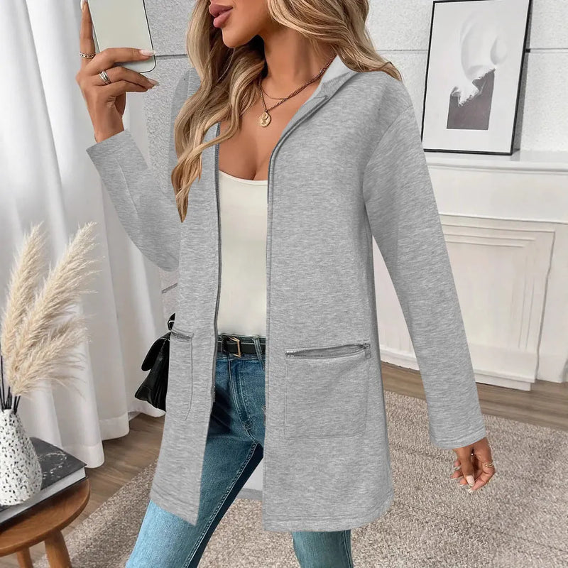 Loose mid-length cardigan coat for women made from polyester fabric in medium thickness with regular sleeves and practical pockets, available in black, grey or khaki colours in Japanese and Korean casual style for everyday wear