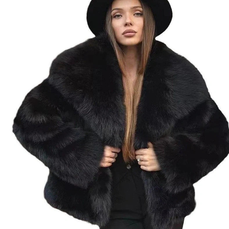 Women's white artificial fur coat with large lapel, long sleeves, and deep pockets shown in street fashion setting