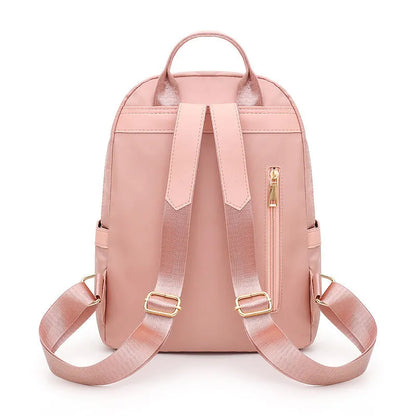 Black square vertical nylon backpack with double shoulder straps showing multiple compartments and anti-theft features