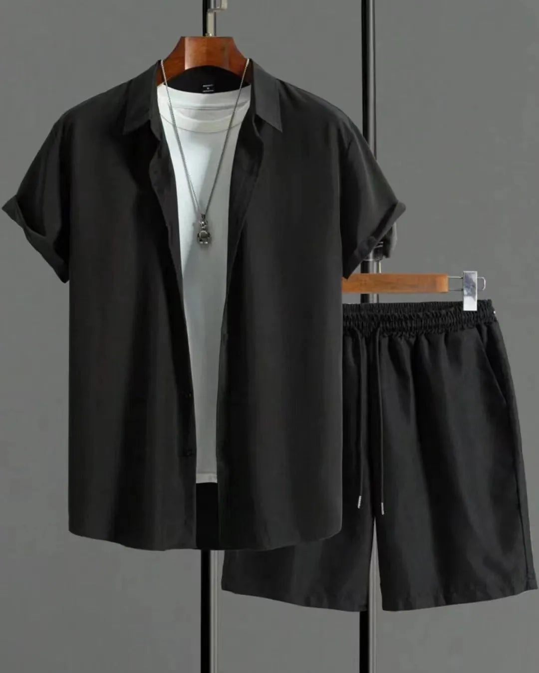 Jacquard short sleeve suit separates in chemical fibre blend polyester with shirt-style jacket and matching shorts