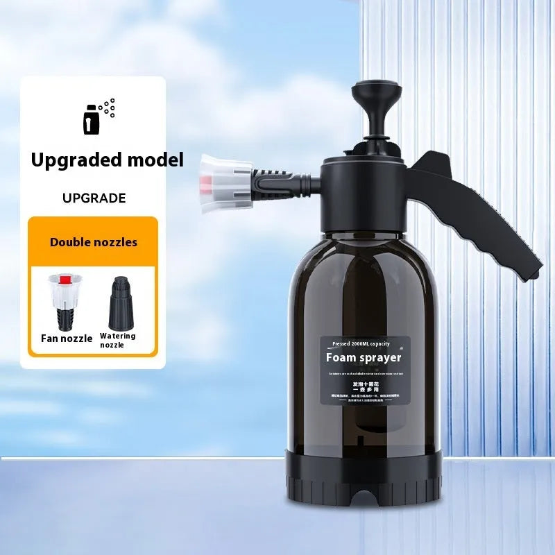 Black 2-litre hand-held foam sprayer with pump handle and two nozzles for car washing and gardening.