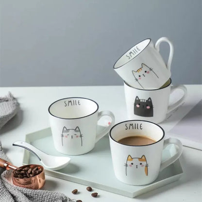 Ceramic coffee cup with cartoon cat design, perfect for couples and coffee enthusiasts