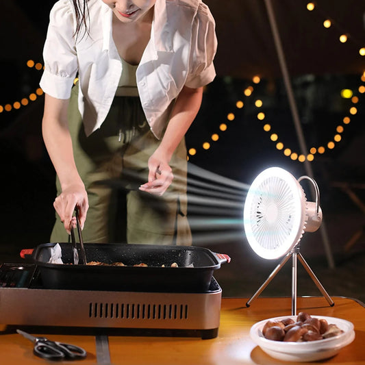 Versatile USB Rechargeable Camping Fan with Tripod Stand and Lantern, offering a premium aluminum alloy construction, 3-in-1 design, and powerful brushless motor for a refreshing outdoor experience.