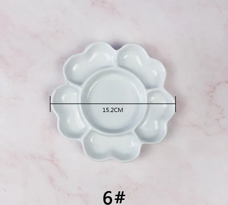 White handmade ceramic plum blossom shaped paint palette for watercolour, acrylic, and oil painting
