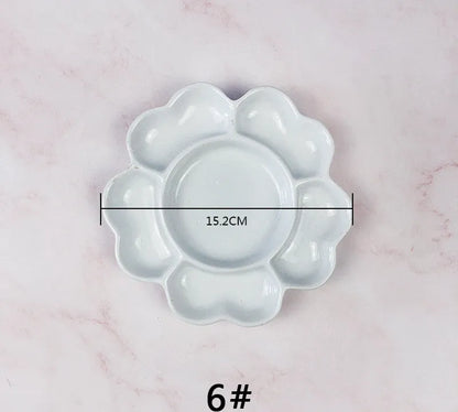 White handmade ceramic plum blossom shaped paint palette for watercolour, acrylic, and oil painting
