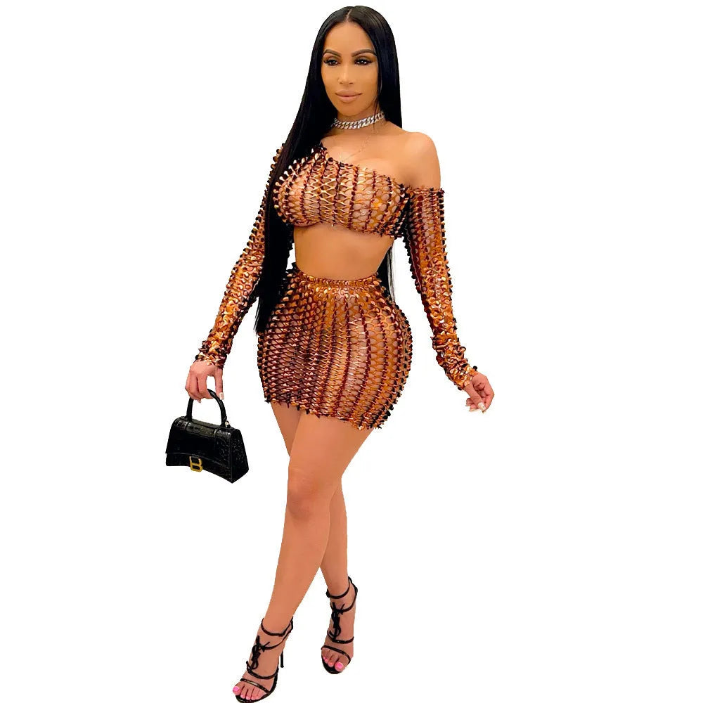 Women's black hollow-out net sleeveless top and short skirt two-piece set.