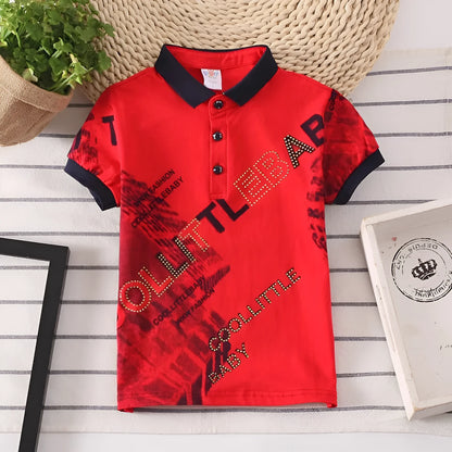 Boys short sleeve cotton lapel shirt in solid colour on a hanger.