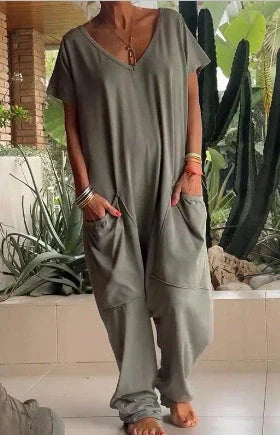 A stylish and comfortable oversized jumpsuit with roomy pockets, available in a variety of vibrant colors.
