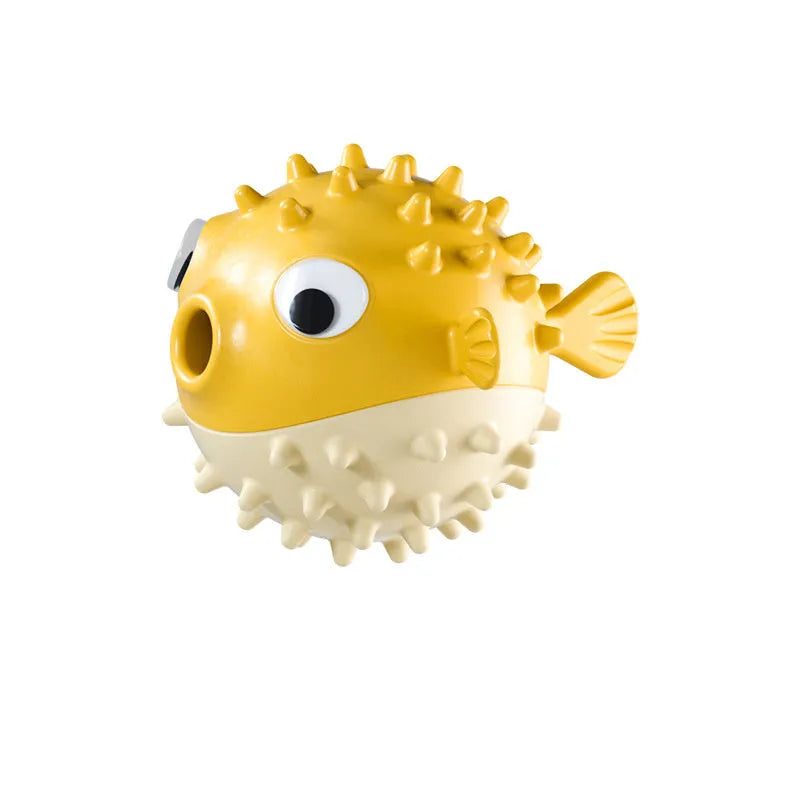 Green fish-shaped interactive dog toy with treat dispensing feature and internal bell for medium large dogs