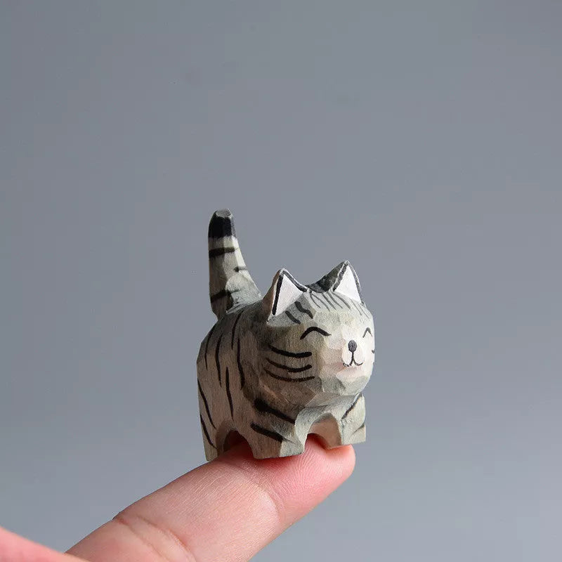 Handmade wooden cat trinkets in gray and orange, perfect for decor or gifts