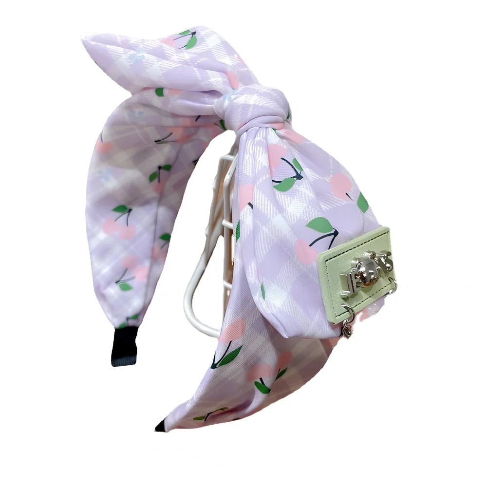 Geometric fringed headband in cloth material with manual craftsmanship details