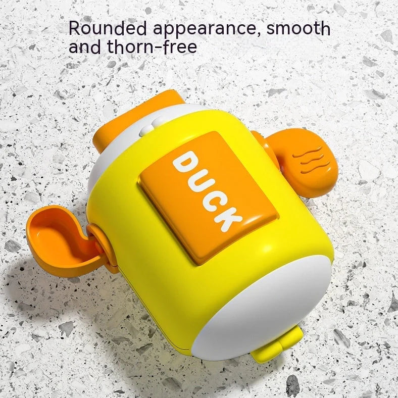 Children's wind-up bath toy measuring 8.2x9.4x5cm with chain attachments in blue pig design