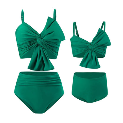 Women's big bow print bikini and swim trunks set in nylon fabric showing colour options