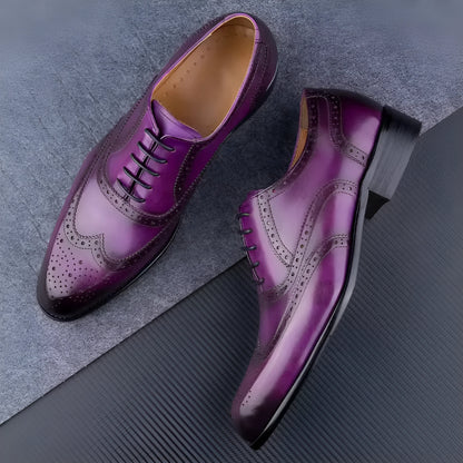 Men's purple leather Oxford shoes with hand-carved design and pointed toe on a rubber sole.