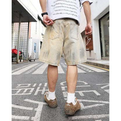 Men's light blue ripped denim shorts with straight-leg style and mid-waist design