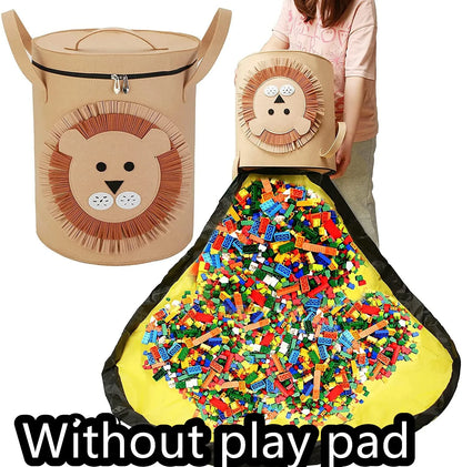 Green felt storage cube with pull rope unfolded into a large square play mat on a wooden floor.