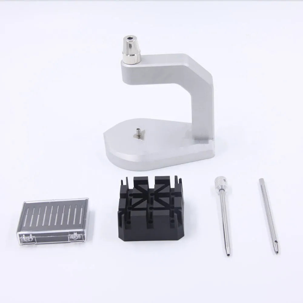 Silver multi-purpose press strap removal tool made from tool steel.