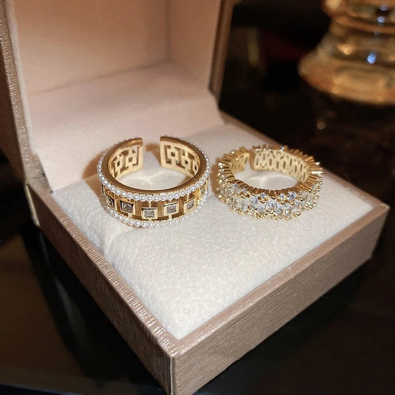 Elegant pearl hollowed-out square open-end zircon ring for women, fashion jewelry with geometric design.