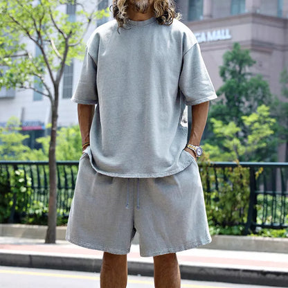 Men's loose sports set with round neck T-shirt and drawstring shorts in various colors