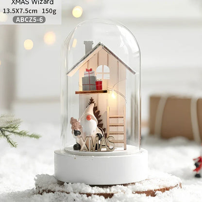 Small 15 cm glass reindeer night lamp in white snowman cabin style casting 100 lumen festive glow on table