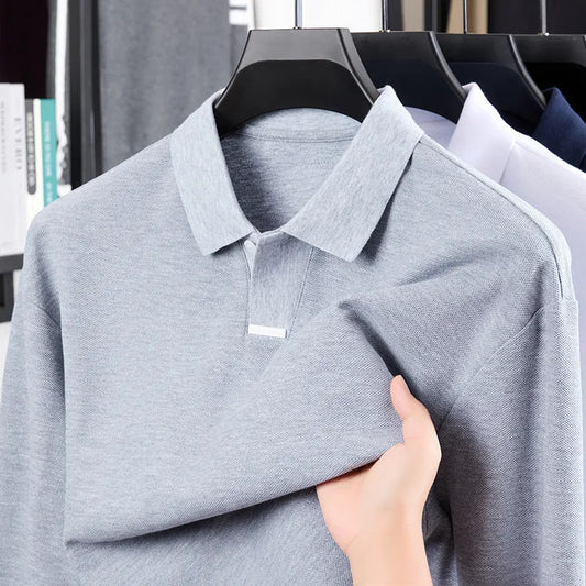 Men's grey cotton polo shirt with asymmetric lapels and long sleeves, showing loose fit and design details