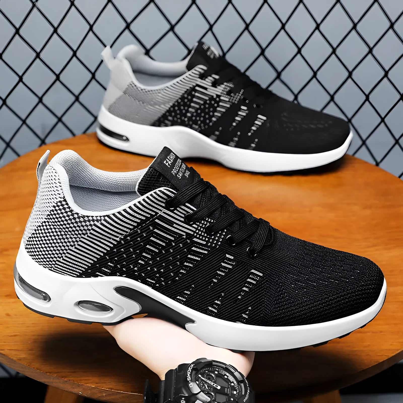 Men's Flyknit mesh casual sneakers in black and blue colour with round toe and lace-up front