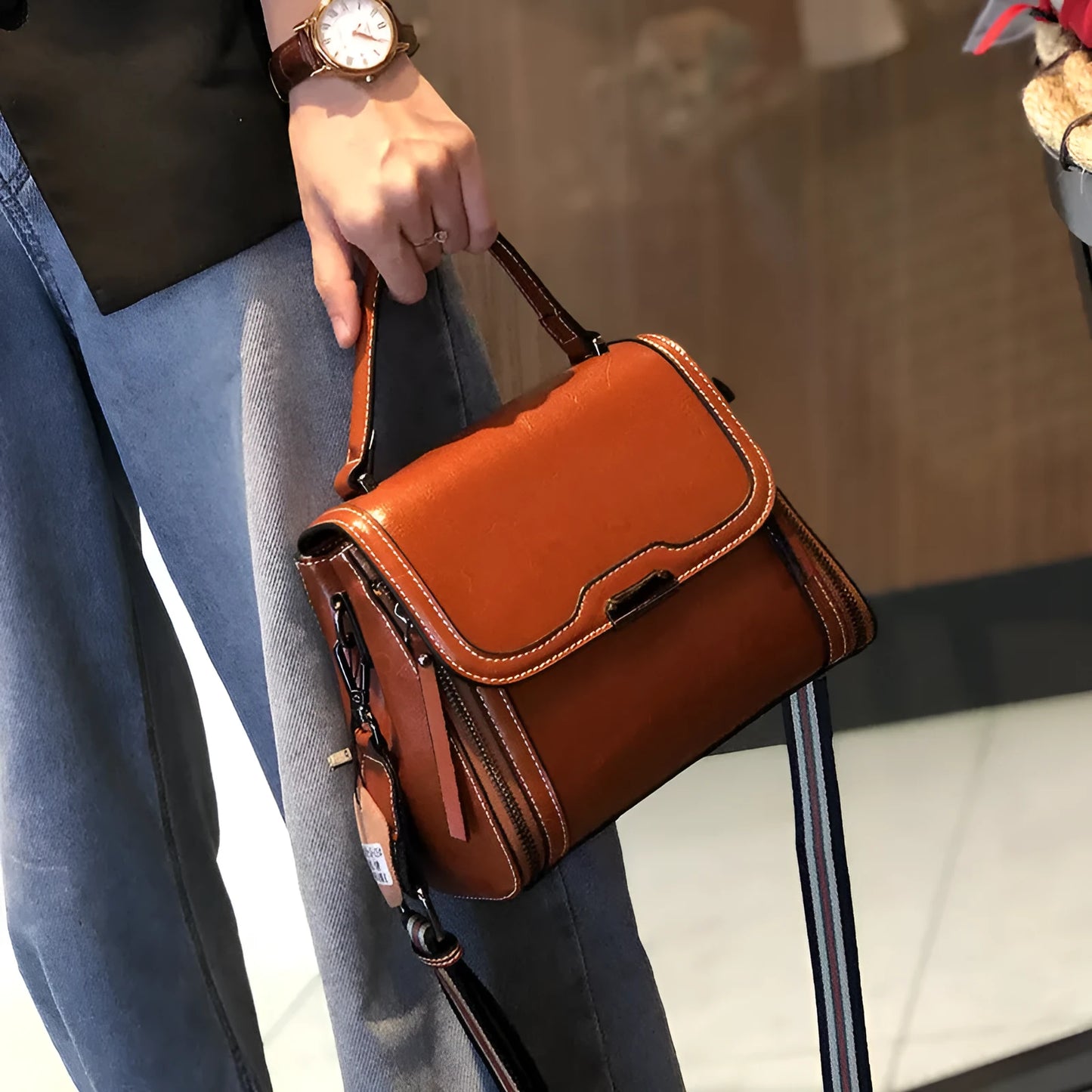 Women's genuine leather retro messenger bag in horizontal square shape with multiple internal compartments