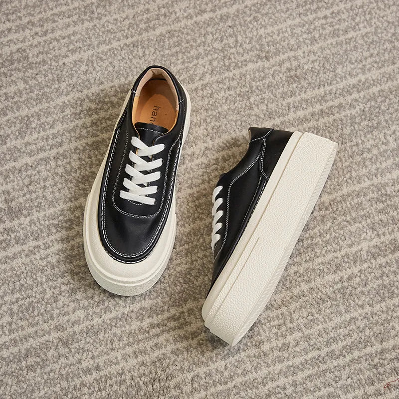 Women's black and white cowhide platform casual shoes with round toe and rubber sole