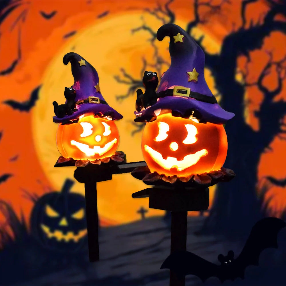 Solar-powered Halloween pumpkin lanterns lighting up a garden at night