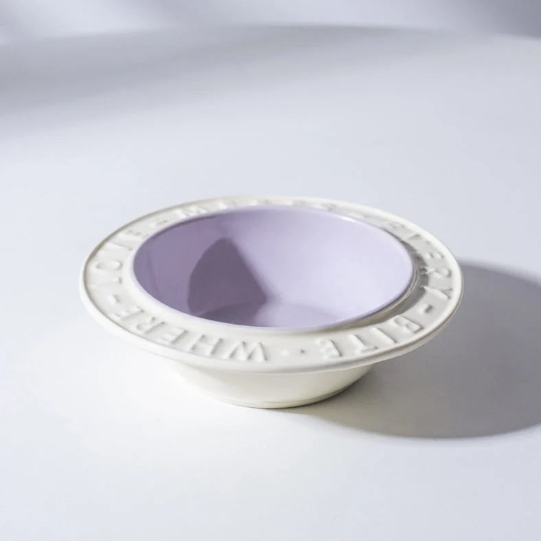 Ceramic cat bowl with iron anti-tip frame in blue colour with silicone pad