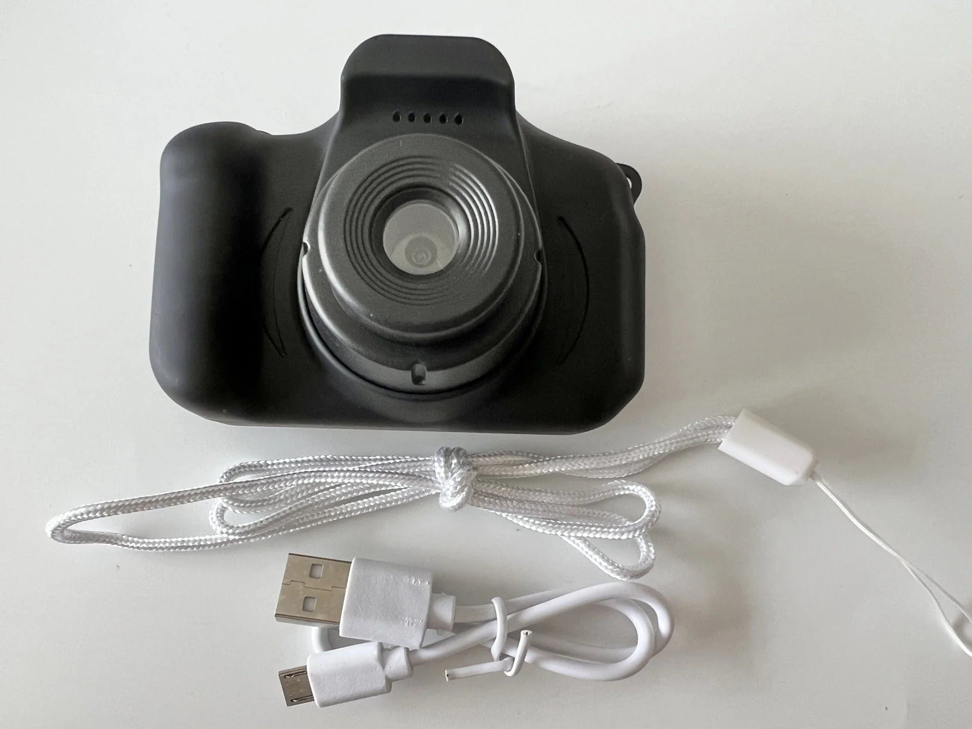 Stylish mini digital camera with cartoon-inspired design, 13MP lens, and 2-inch HD screen for kids to capture their adventures