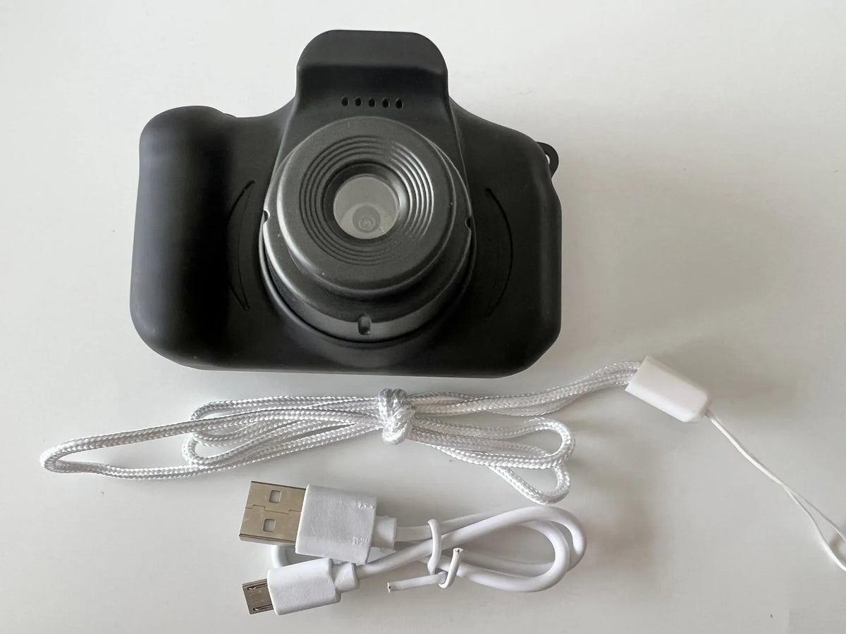 Colourful kids digital camera with silicone case showing 2-inch screen and lens.