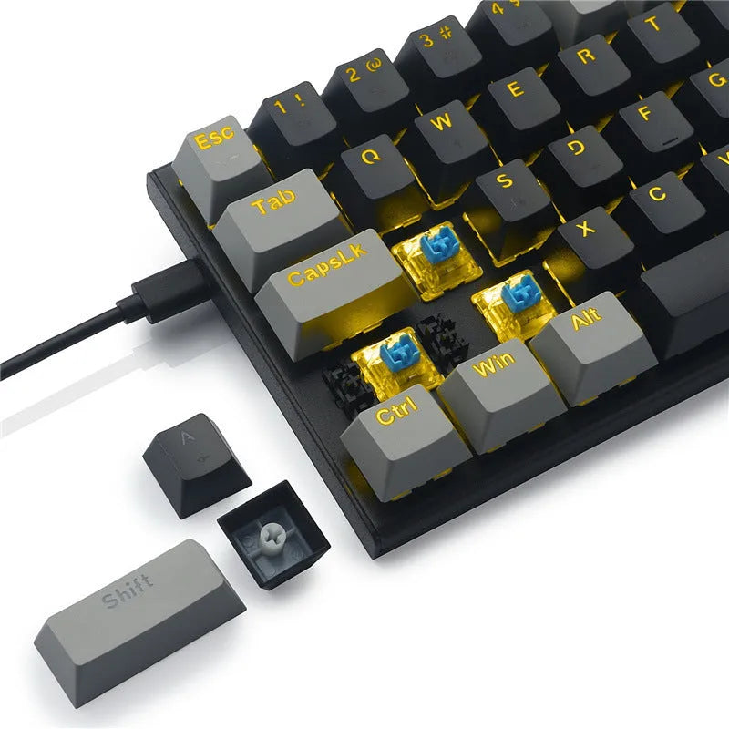 Aluminium alloy mechanical keyboard key caps in black, grey, and green colour scheme