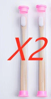 Bamboo toothbrush with wood colour handle measuring 18.5cm long with soft white bristles in protective tube