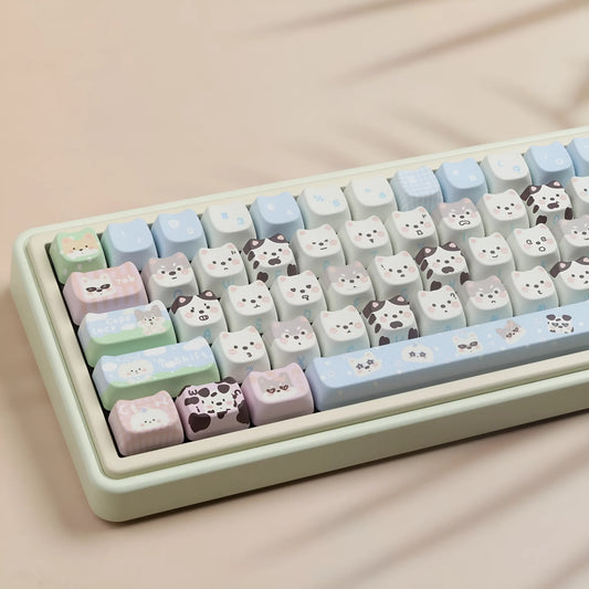 Full set of PBT key caps with sublimated cat and puppy design for mechanical keyboards.