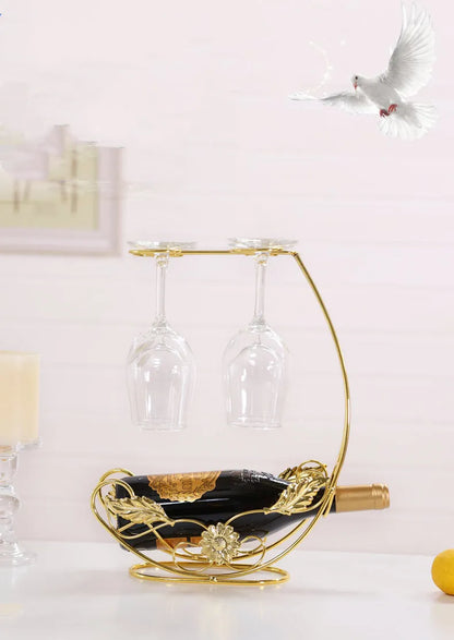 Iron wire wine rack holding four wine glasses, European style, bronze or gold finish.