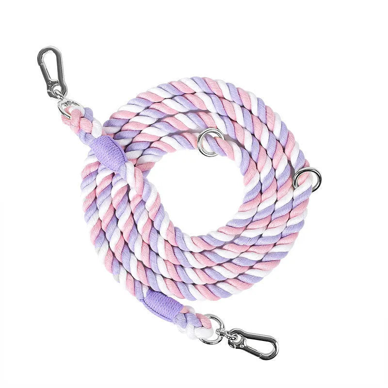 Woven rainbow pattern dog leash with double grip handles and a metal clasp.