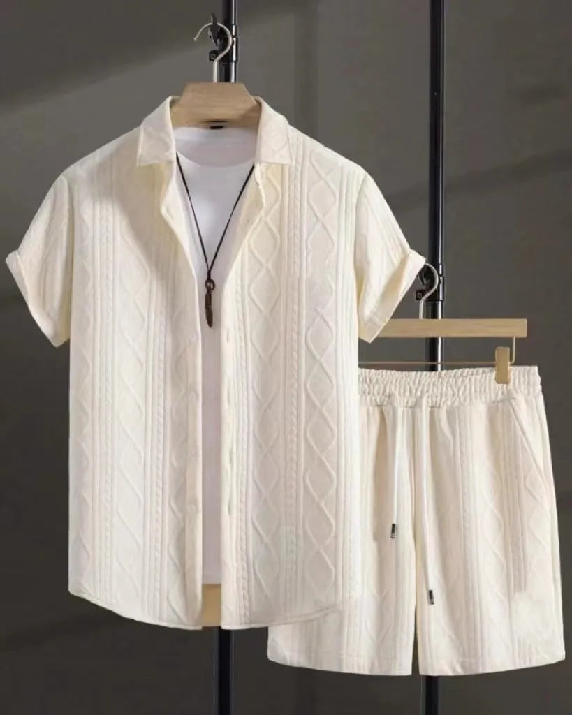 Jacquard short sleeve suit separates in chemical fibre blend polyester with shirt-style jacket and matching shorts