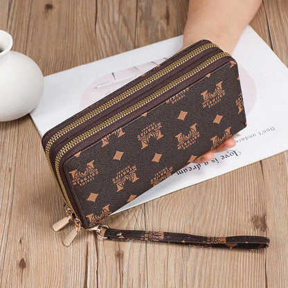 Long black retro-style PU leather wallet clutch with a printed pattern, showing a mobile phone pocket and a zippered coin purse.