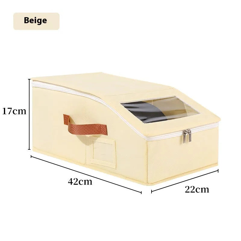 Grey foldable woven fabric storage box with dimensions 42cm by 22cm by 17cm for organising caps and sundries.