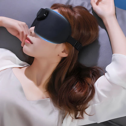 Black smart eye massager with micro-current technology and USB charging cable