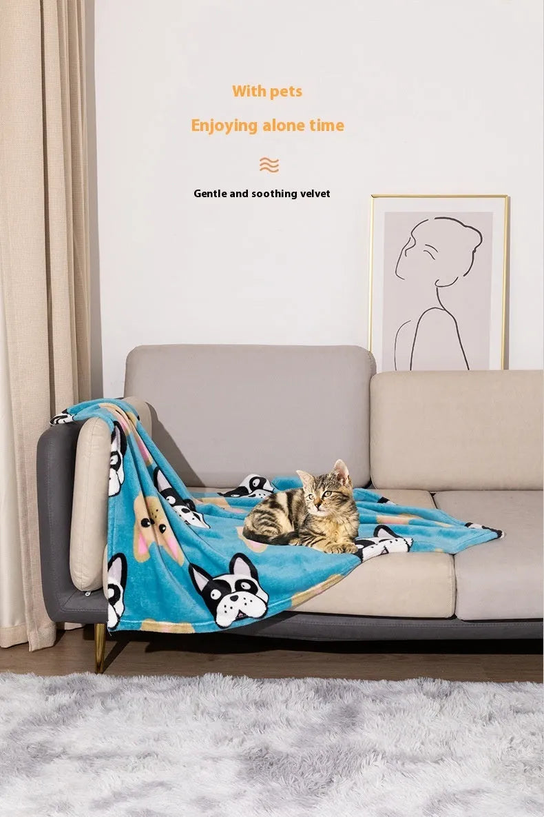Blue dog cartoon print double-sided flannel pet blanket shown in a dog crate.