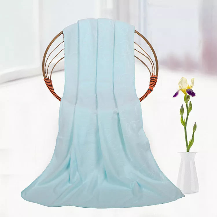 Bear embossed microfiber bath towel in vibrant colors, quick-drying and soft