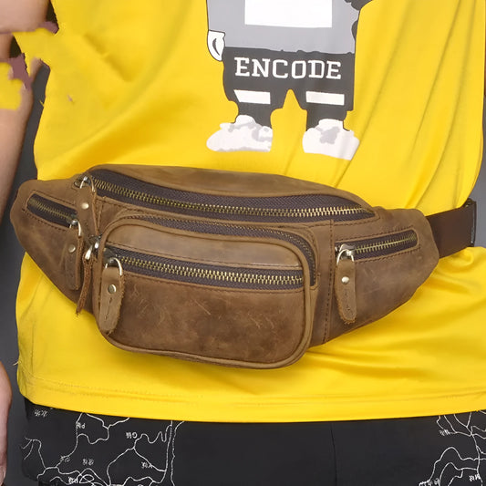 Retro style brown cowhide leather messenger bag with a single shoulder strap.
