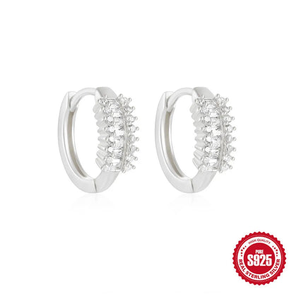 Sterling silver geometric stud earrings with small round diamond accents in gold or silver finish