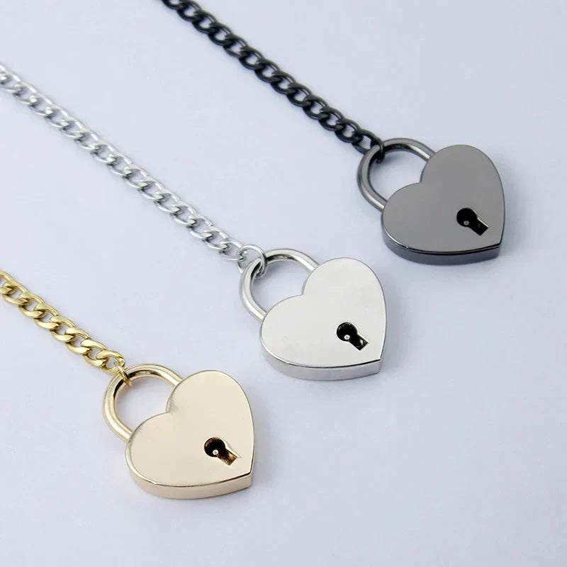 Adjustable heart-shaped O-ring slip chain necklace in black, silver, and gold