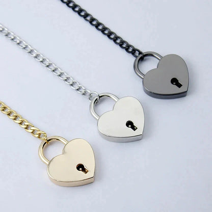 Adjustable heart-shaped O-ring slip chain necklace in black, silver, and gold