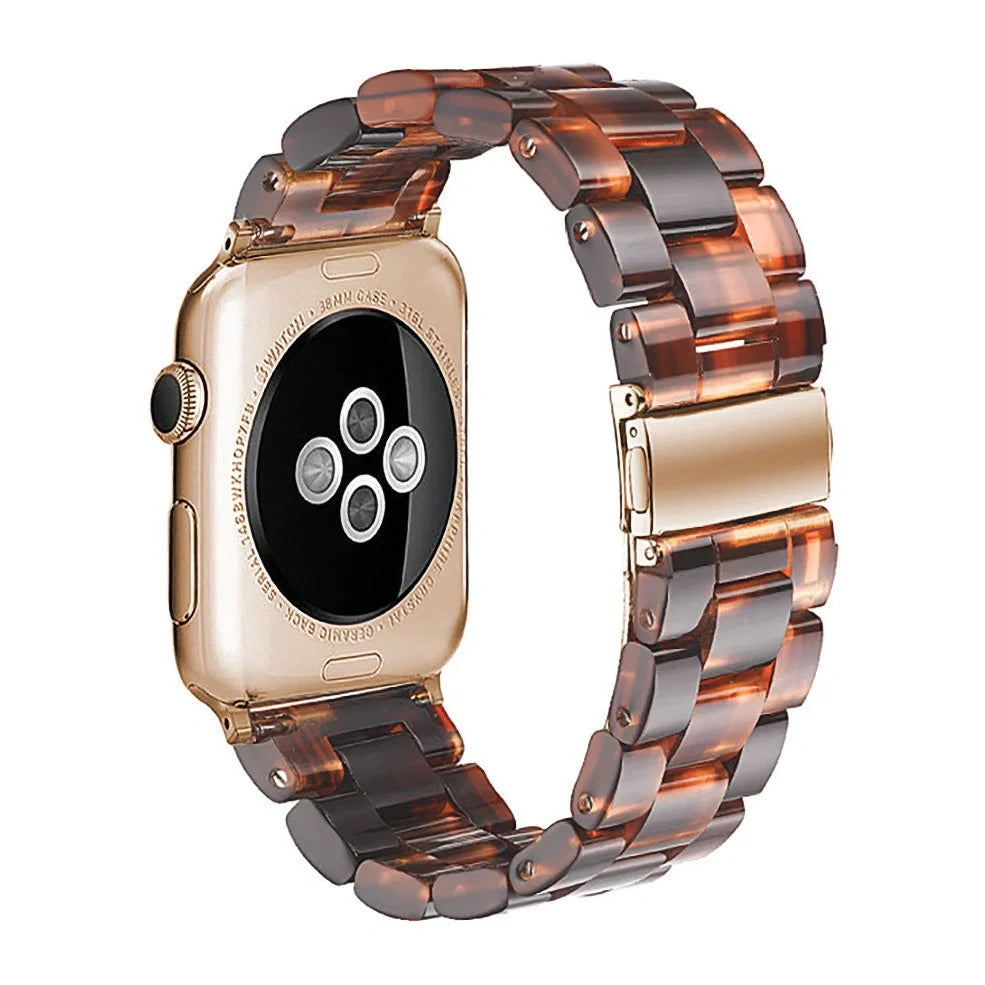 Slim resin Apple Watch strap showing attachment mechanism and colour options