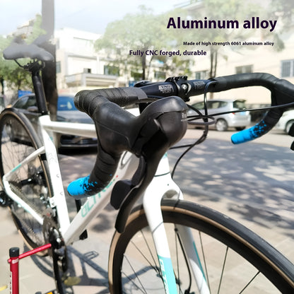 Black UNO road bike aluminium racing handlebar with small bent profile showing 31.8mm clamp markings