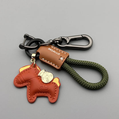 Handmade cowhide car key ring pendant with zinc alloy pony belt buckle and flanelle rope in nine colour options